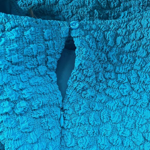 Anthropologie sinched Teal Textured Sleeveless Mini Dress tight at the bottom - Picture 12 of 12